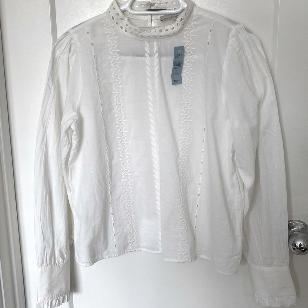 White blouse from LOFT size small petite it can fit medium size